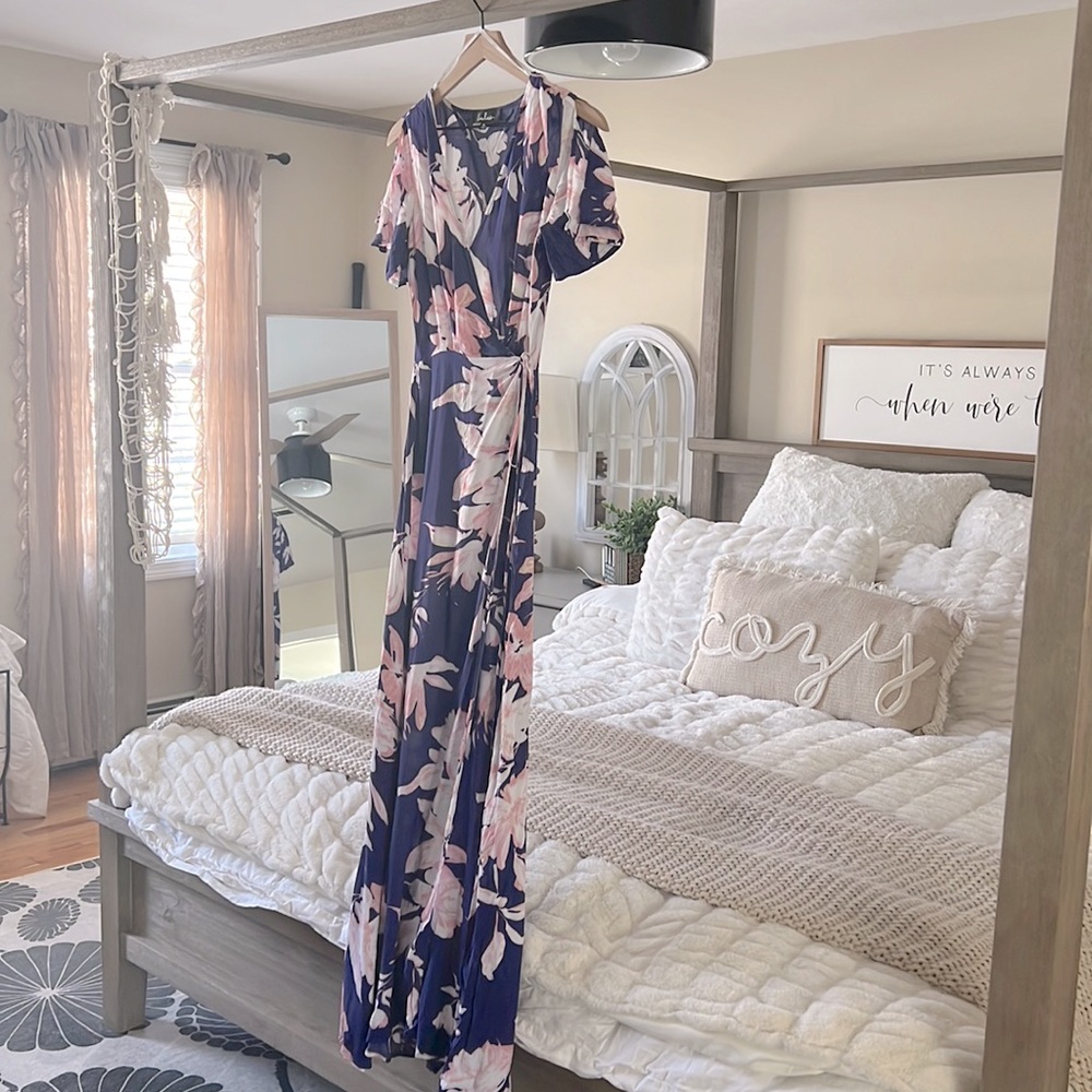 Blue, pink and white floral maxi dress that opens in the front.